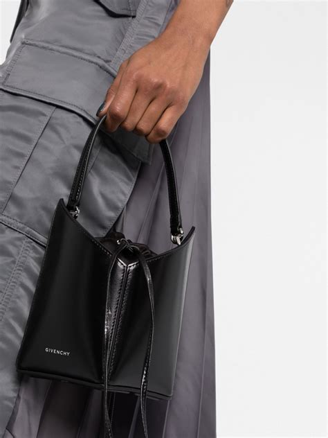 givenchy cut out bucket bag|Givenchy star clutch bag.